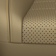 Nappa leather‑faced with perforated inserts – Light Frost Beige with Light Frost Beige accent stitching (Light Frost embroidered Overland<sup>®</sup> logo and Jeep<sub>®</sub> Brown piping on Overland)