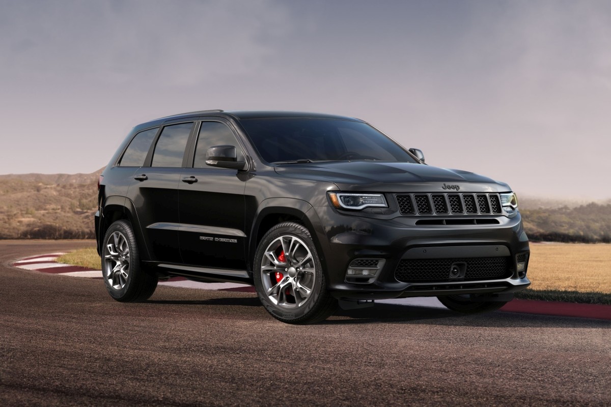 Front view of the 2020 Jeep Grand Cherokee Trackhawk being driven on a race track