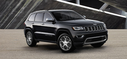 2022 Grand Cherokee WK Limited in Diamond Black parked in under an urban bridge