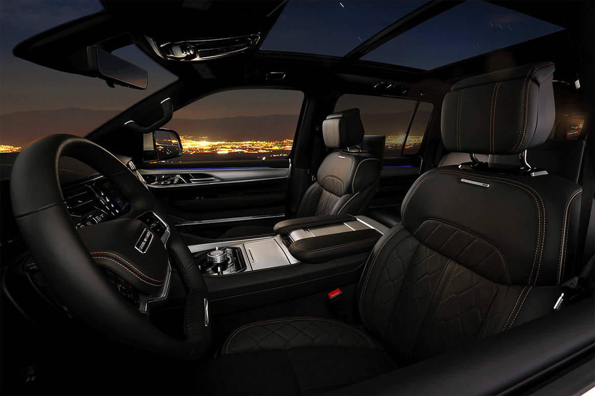 The digital console of an All-New 2022 Grand Wagoneer, with the screen displaying the front-seat massage system.