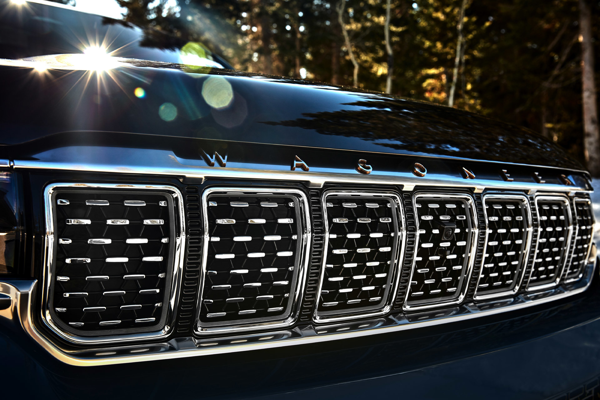 The front grille of an All-New 2022 Grand Wagoneer.