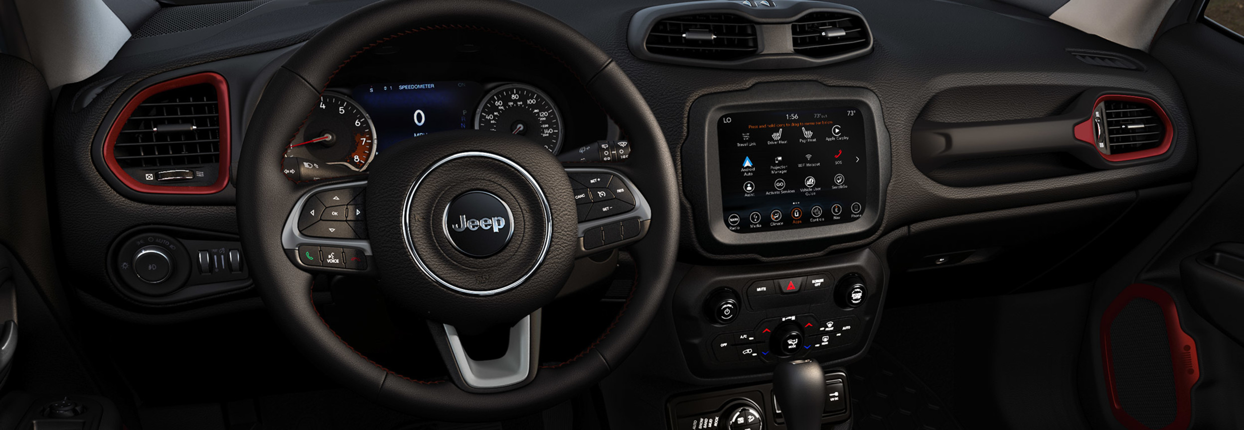 Vue intérieure d’un Jeep Renegade, y compris le volant et le système de divertissement