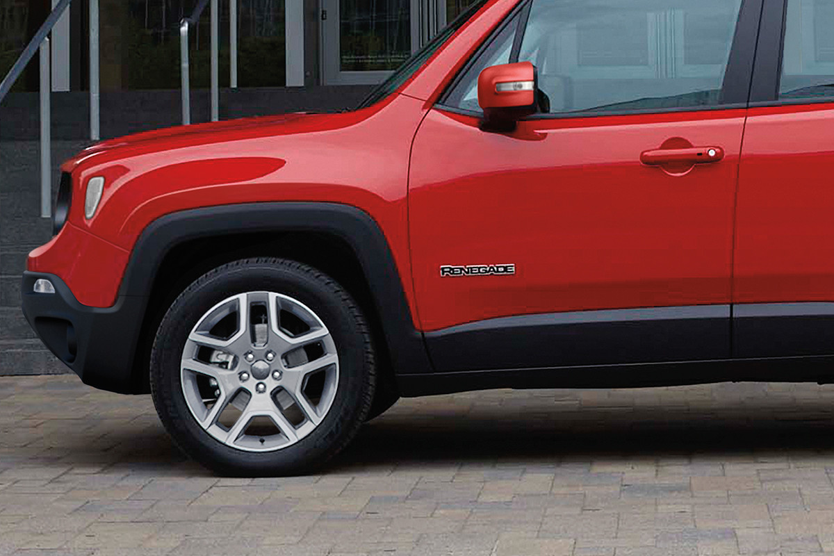 Créez l’allure qui vous ressemble Vue de côté d'un Jeep Renegade rouge.