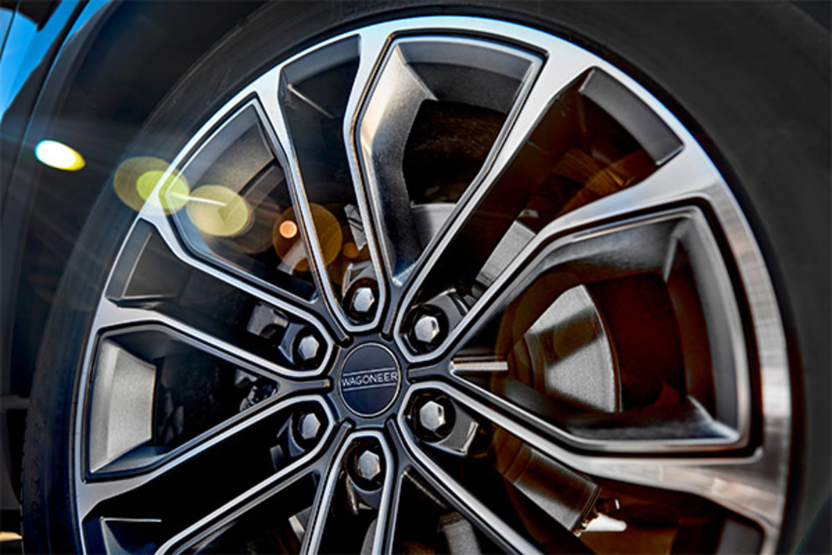 View of a 2022 Grand Wagoneer 22-inch Aluminum Wheel in focus