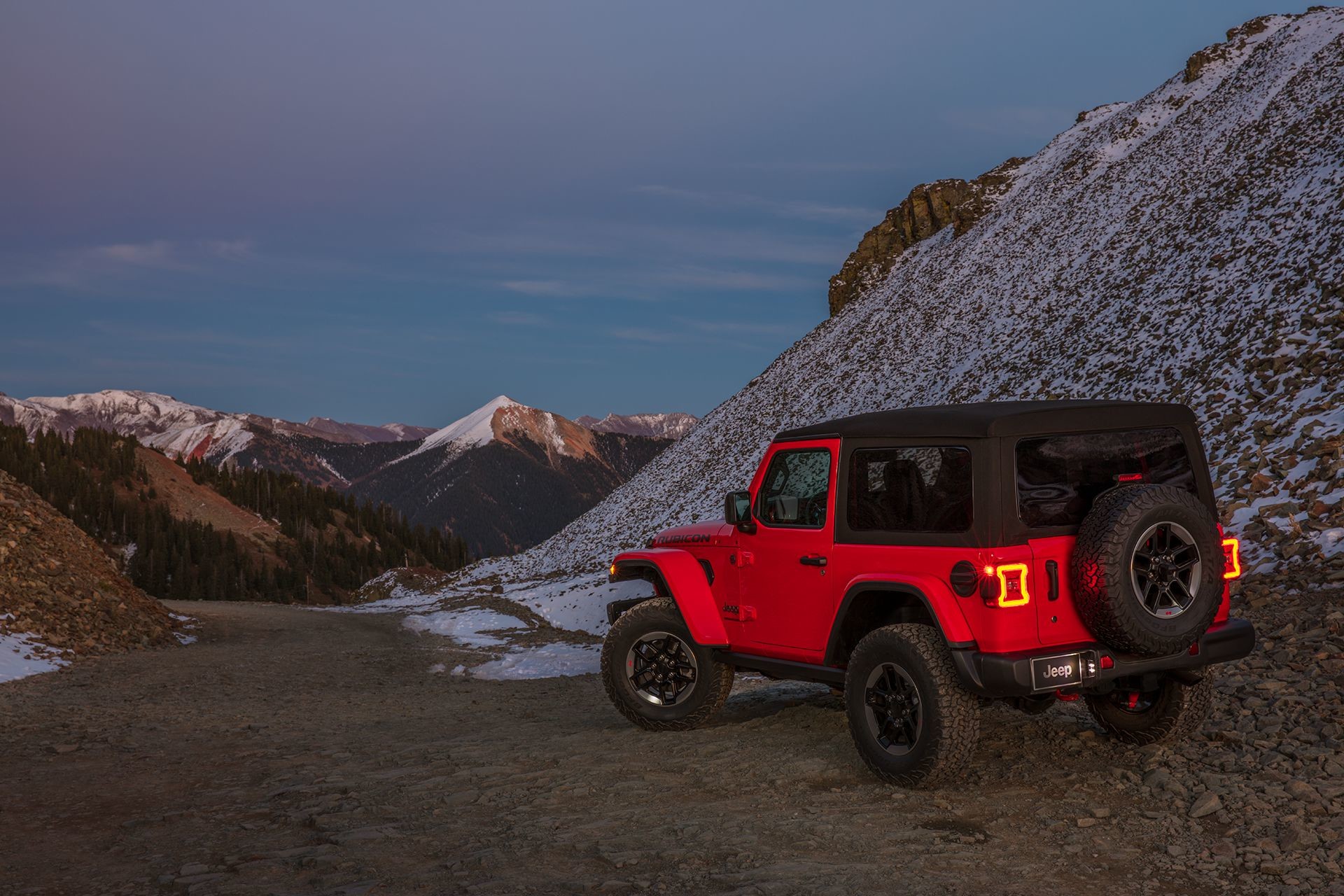 2018 Jeep Wrangler JL tire pressure monitoring system, side view, with mountain landscape