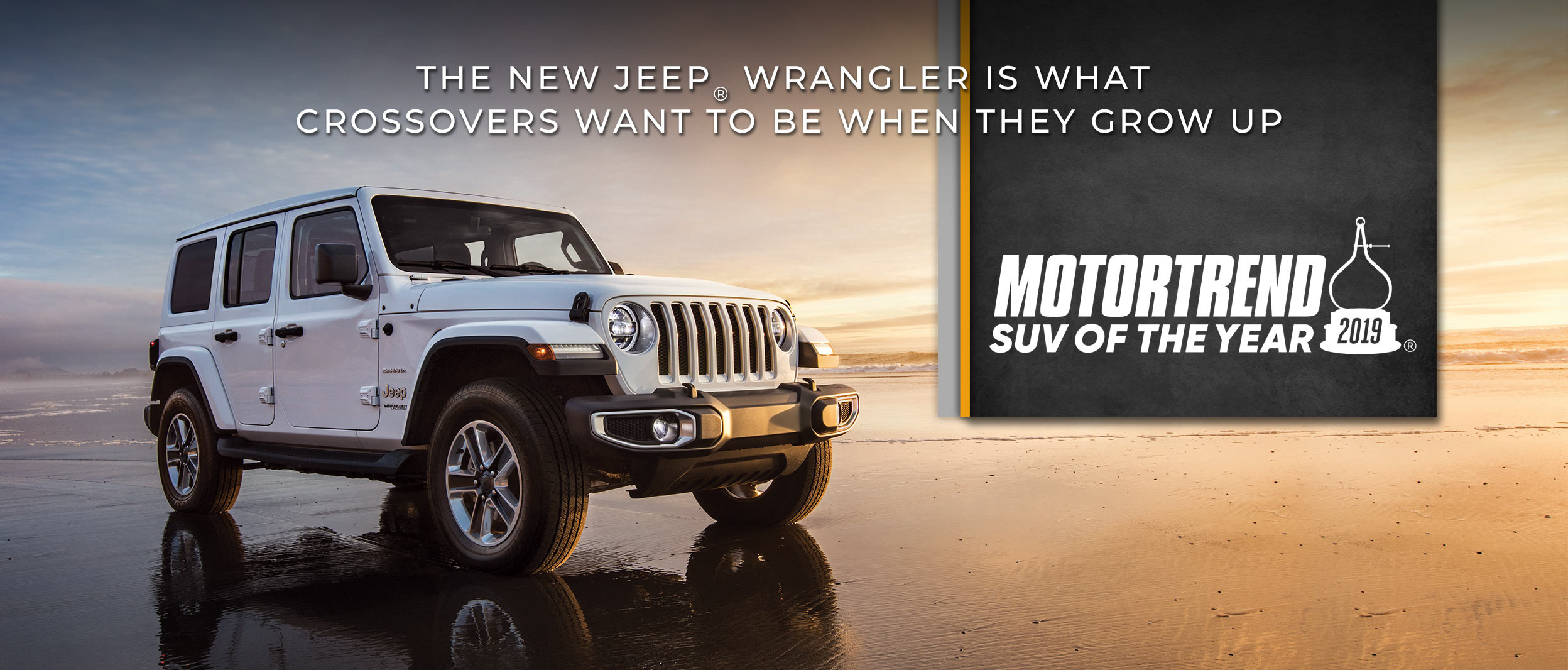 2019 Wrangler Unlimited Rubicon in Ocean Blue parked on hilltop, mountains behind.