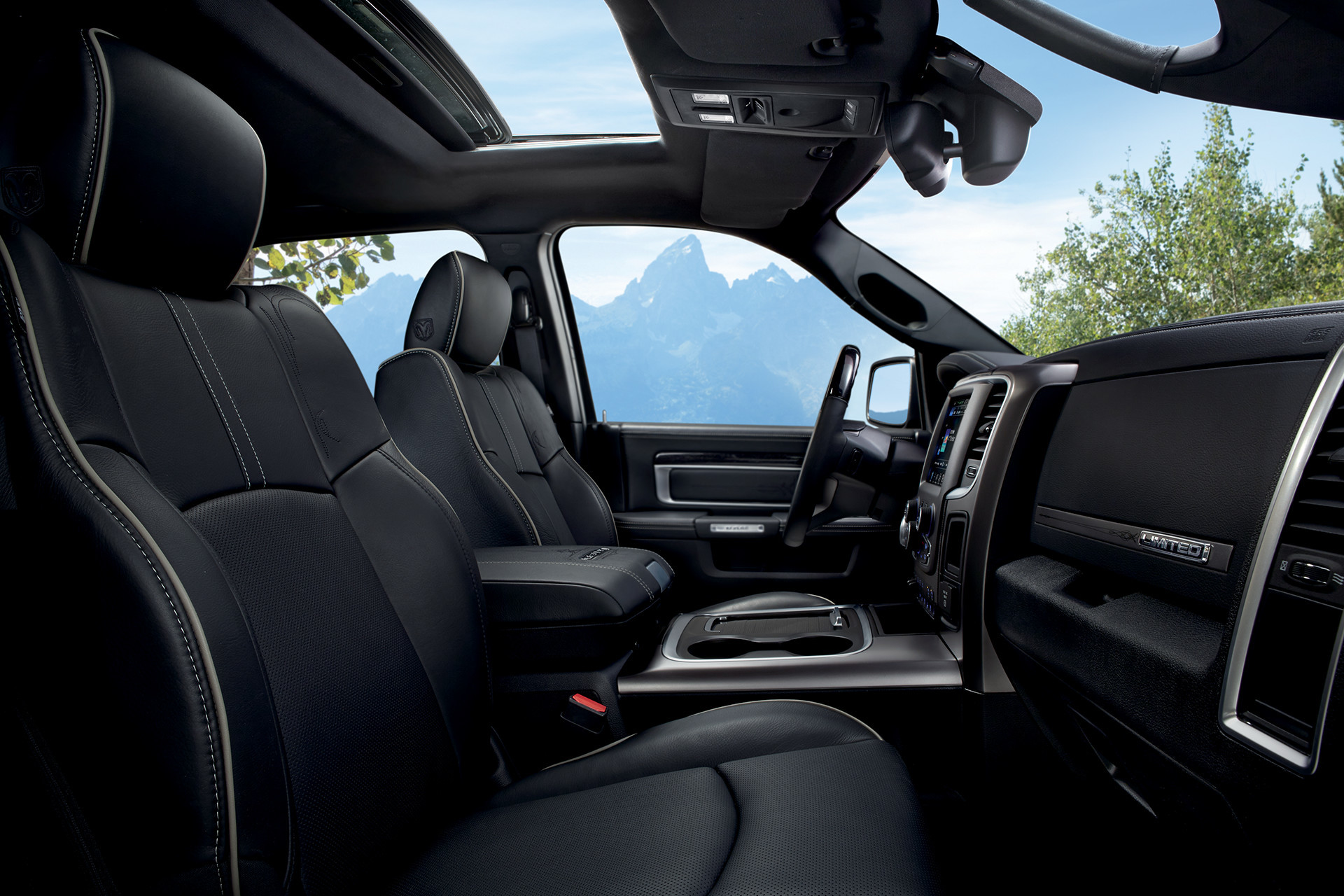 2018 RAM 1500 interior front seating with natural lighting