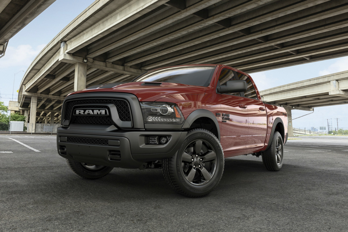 Front view of the red 2019 Ram 1500 Classic Warlock parked under a bridge