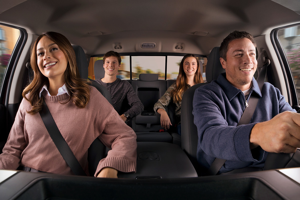 A family of four sitting in the 2019 Ram 1500 Classic