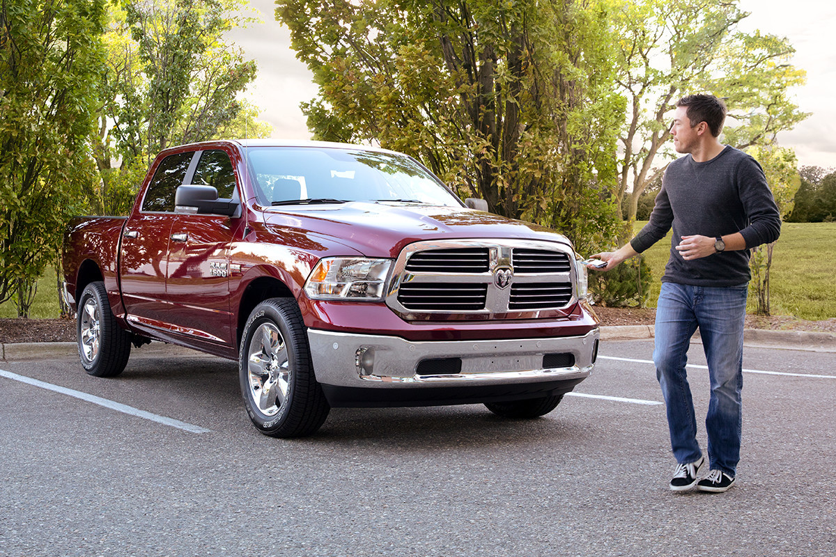 Man walking by parked 2019 Ram 1500 Classic