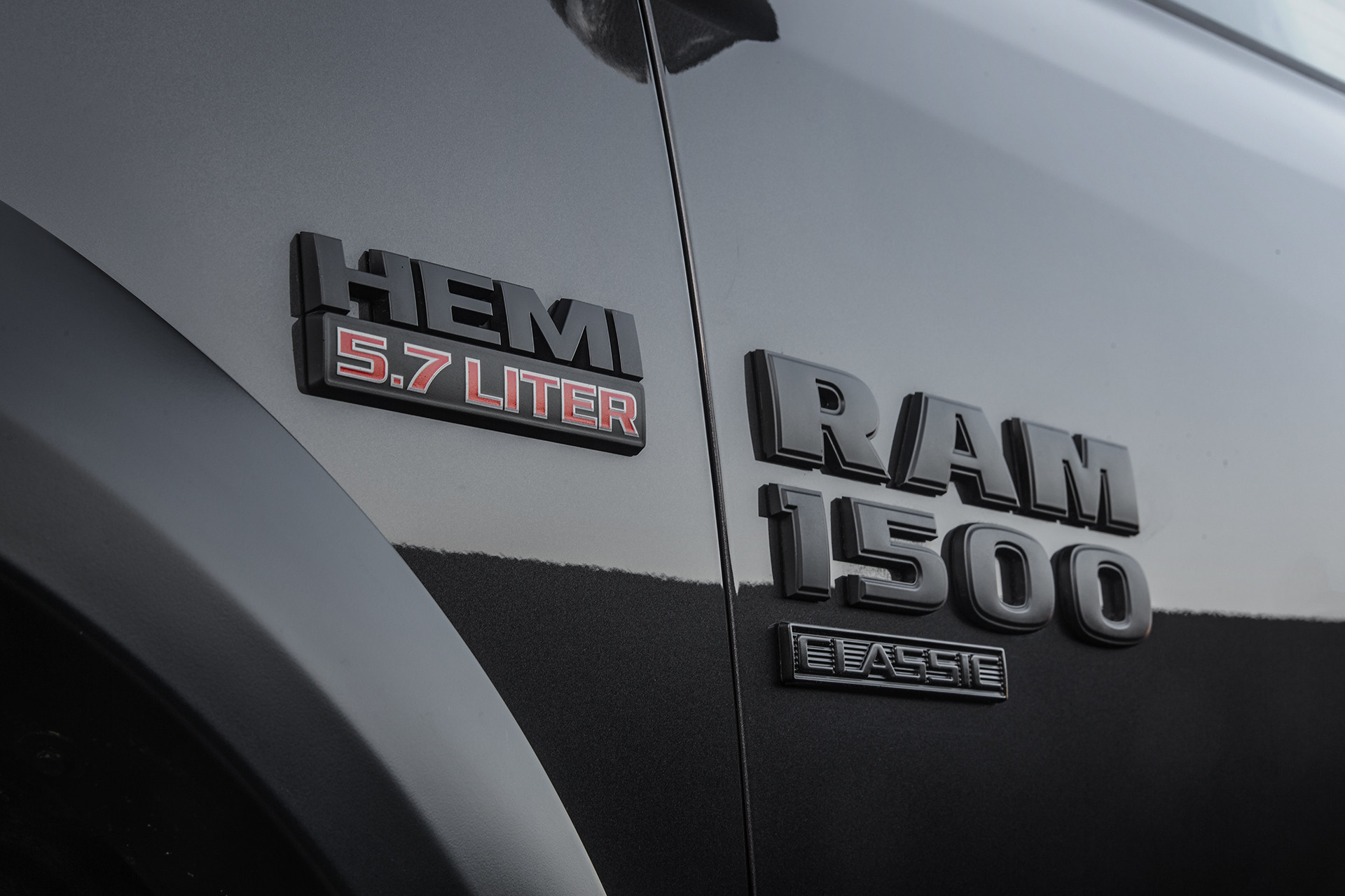 Close up view of front fender and door of the black 2020 Ram 1500 Classic