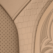 2019 Ram 1500 interior seating premium leather with perforated inserts and laser etching light mountain brown mountain brown