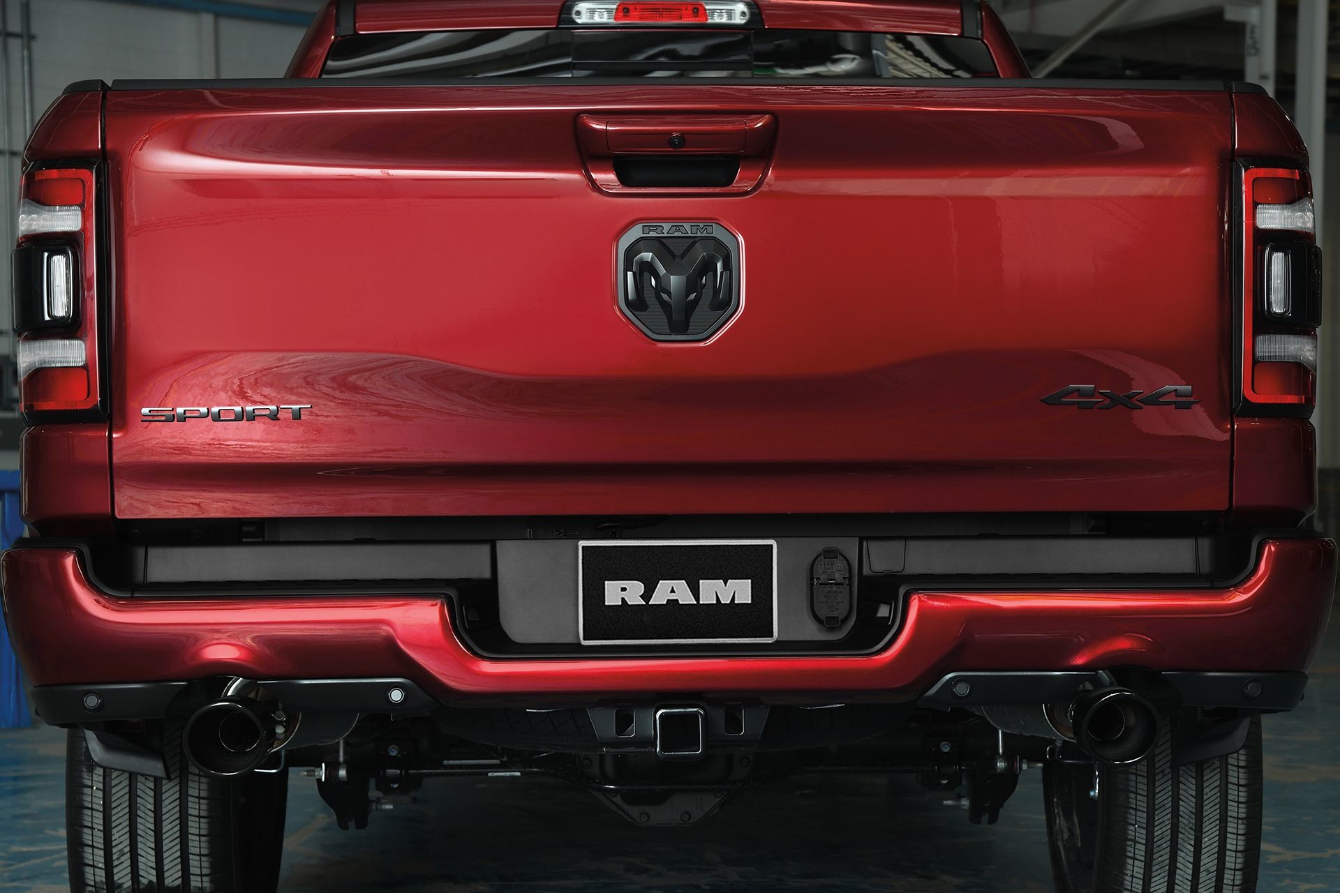 2019 Ram 1500 Sport red monochromatic exterior with all black badging and body colour bumpers