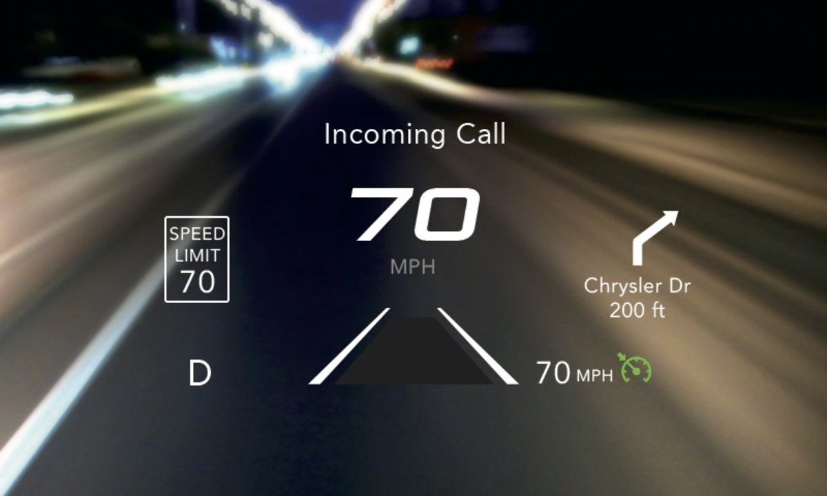 The heads-up-display function of a 2023 Ram 1500 TRX displaying the speed limit, current speed, navigation, and incoming call.