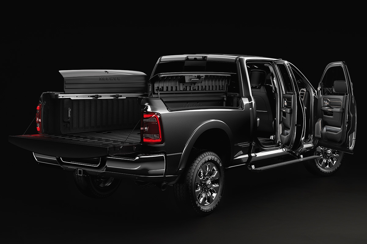 Rear three quarter view of the new 2019 Ram 2500 diamond black highlighting class exclusive RamBox Cargo Management System