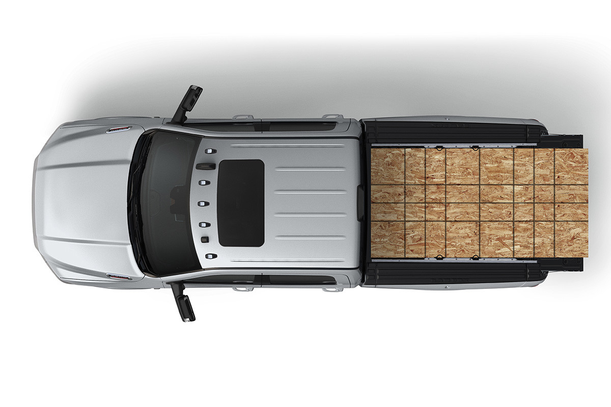 Top view of the new 2019 Ram 2500 silver stacked with lumber at the cargo