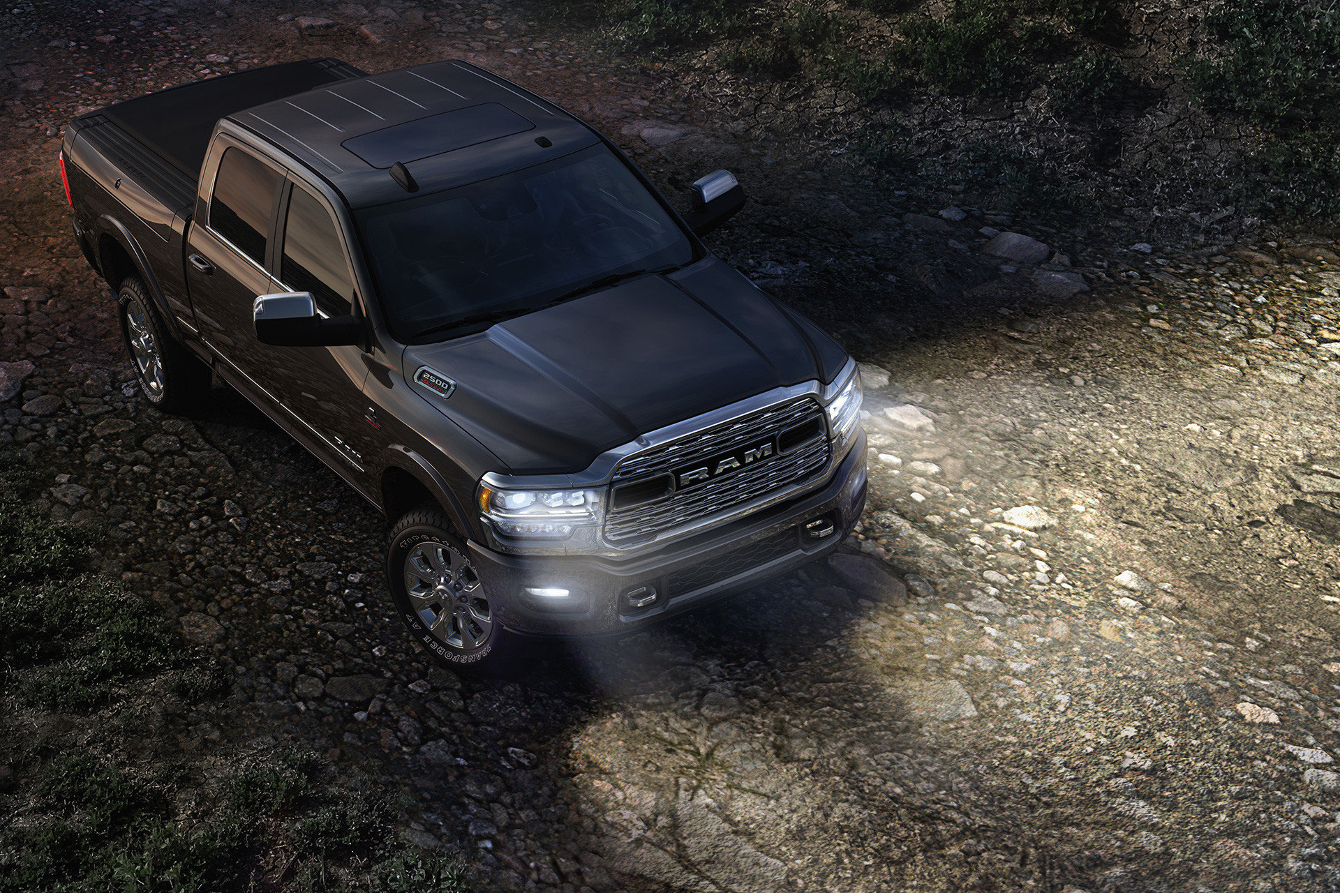 Front view of the new 2019 Ram 2500 white being driven on a road
