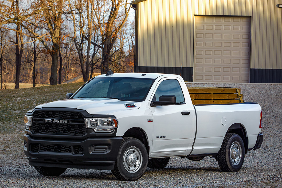 The 2020 Ram 2500 parked in front of building in a suburban area