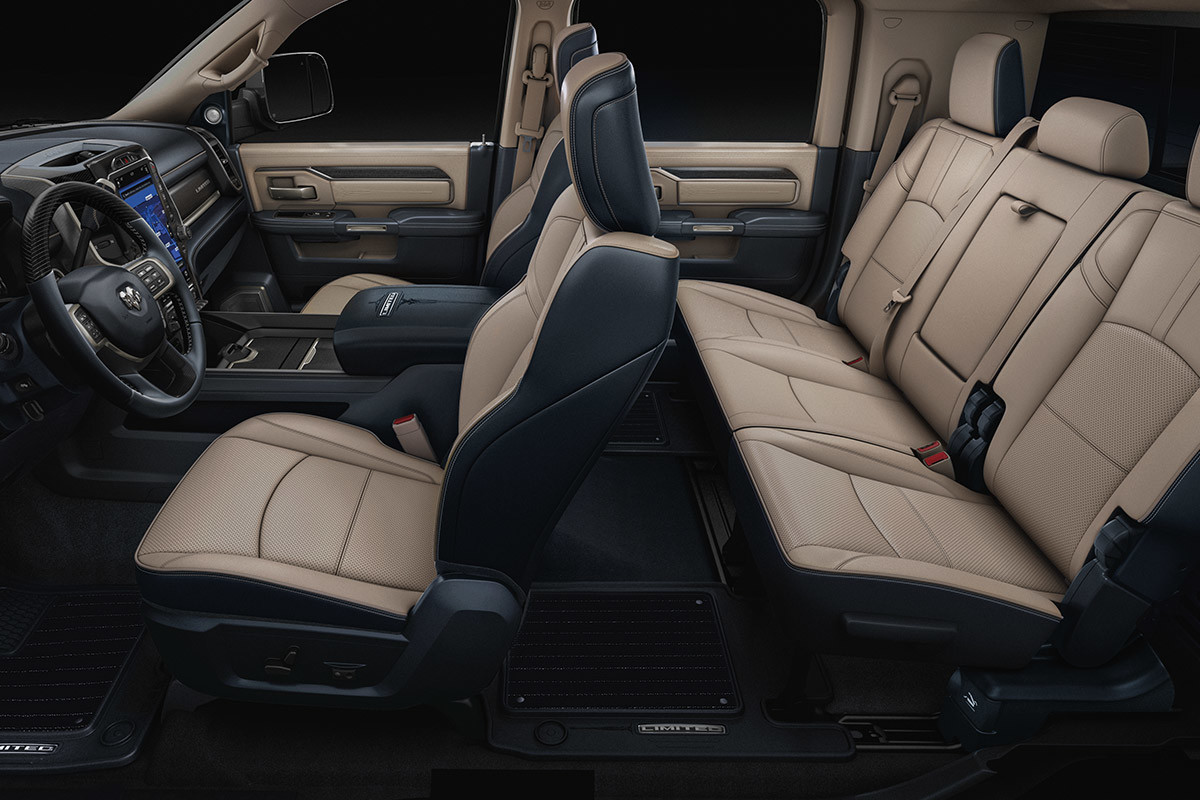 Interior shot of the Ram 2500 featuring the front and second row seats in tan leather.