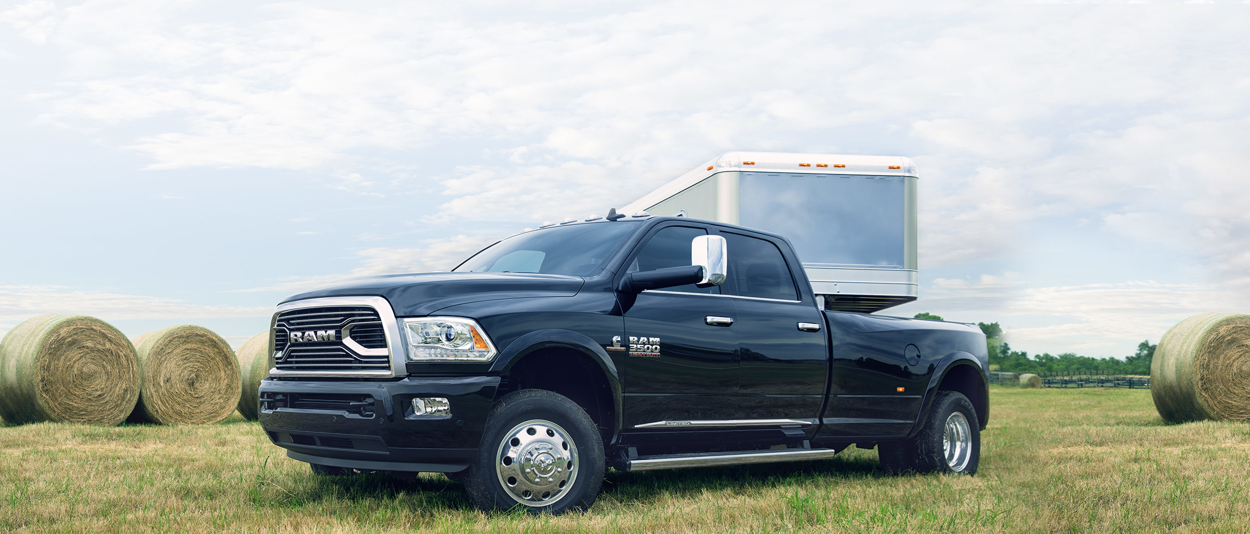 2018 RAM 3500 truck towing side view