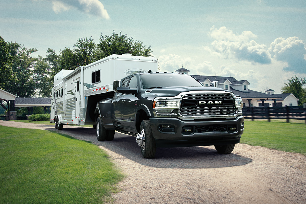 2019 Ram 3500 exterior shown pulling a 5th-wheel trailer.