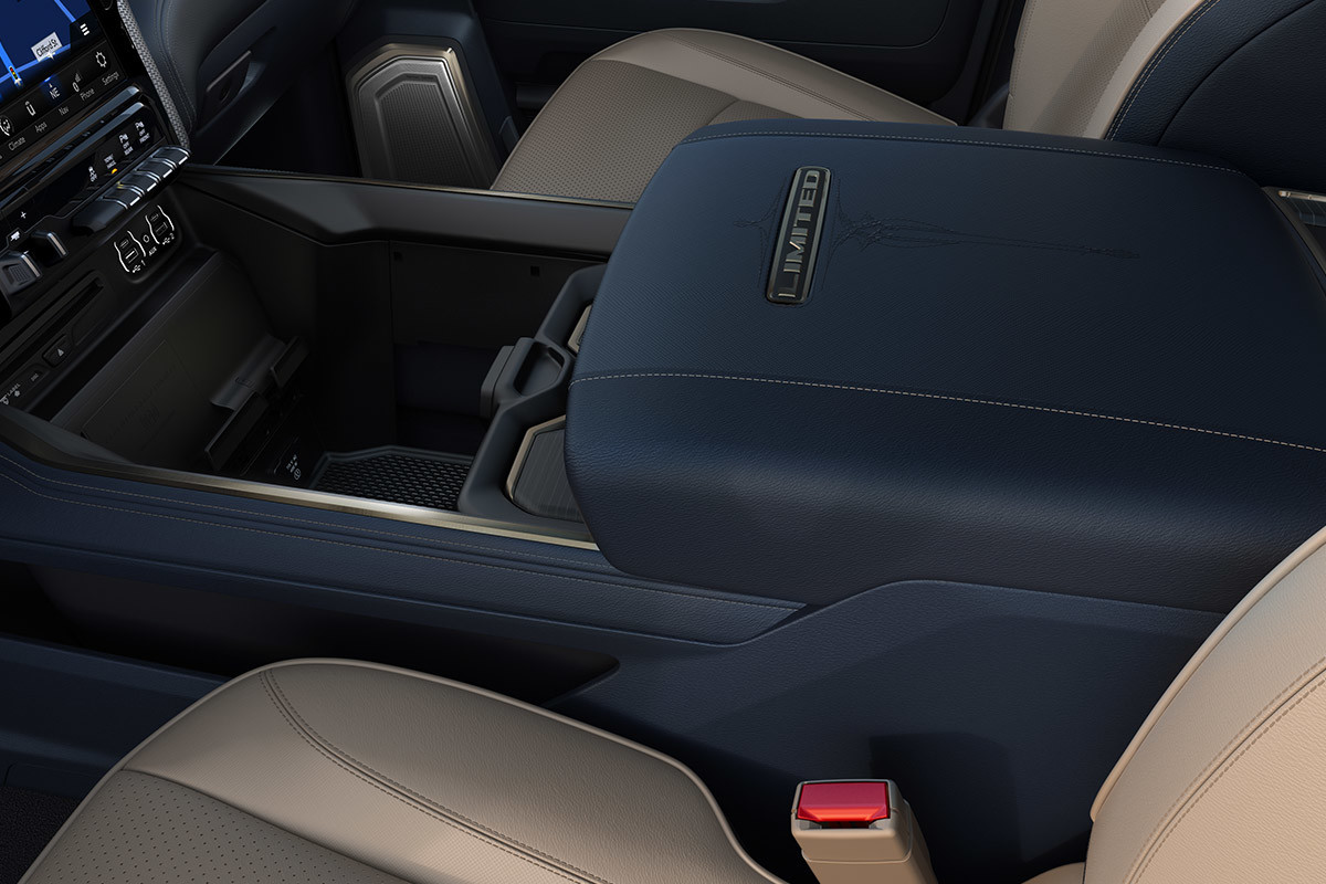 Navy centre armrest and consoles of a 2020 Ram 3500.