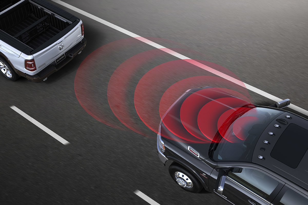 Black 2020 Ram 3500 showcasing its forward collision warning feature.