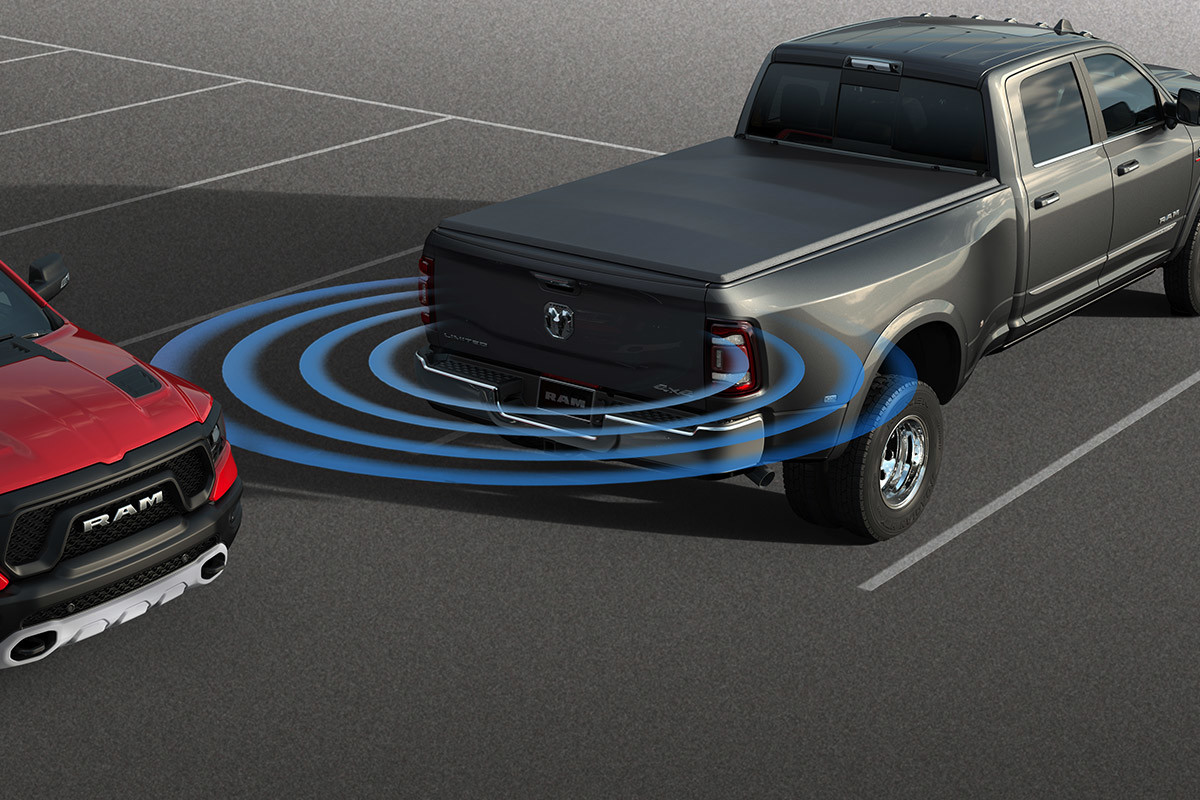 Black 2020 Ram 3500 showcasing its rear parking assist system.