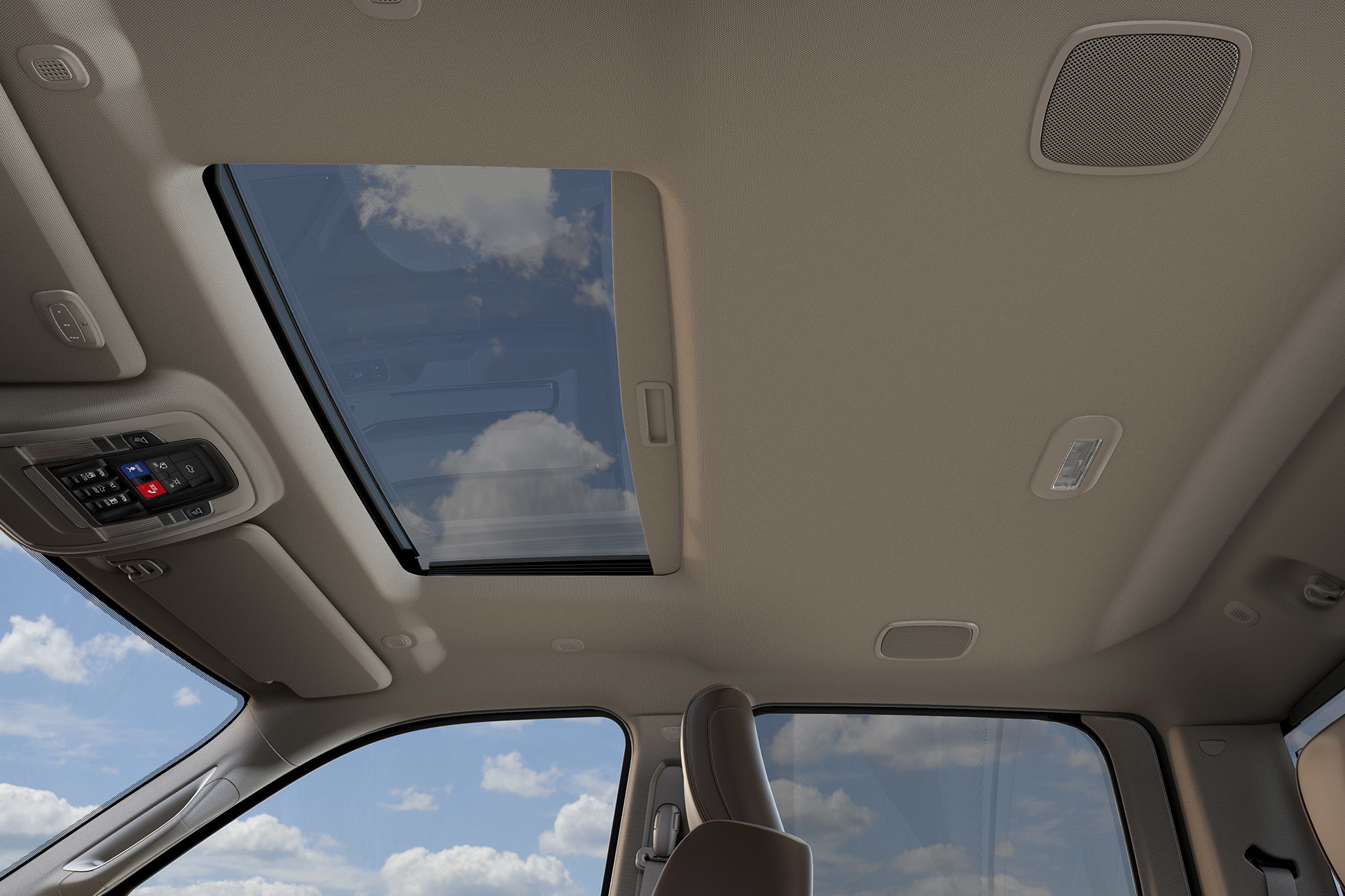 A close-up interior view of the available power sunroof over the front seats of the 2021 Ram 3500.
