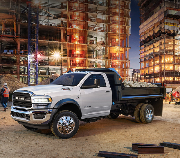 A new 2019 Ram Chassis Cab parked at a construction site.