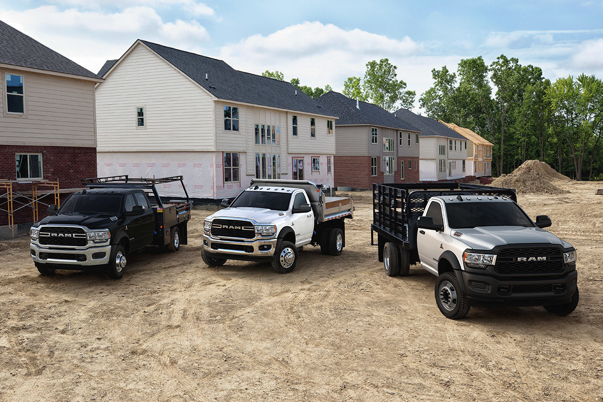 Three the Ram 2020 Chassis Cab parked beside each other in house construction site