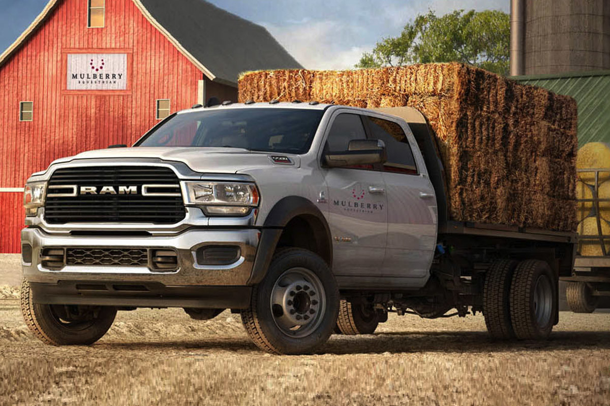 The white 2020 Ram Chassis Cab parked in front of barnyard during daytime