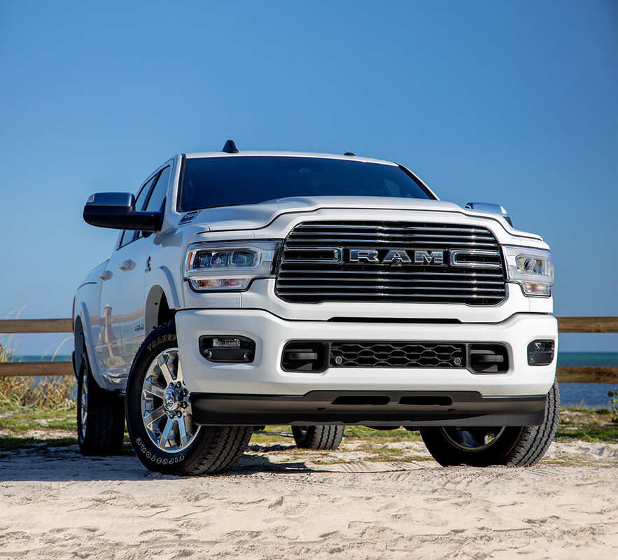 Front view of White 2021 RAM 1500, parked on the side of the road