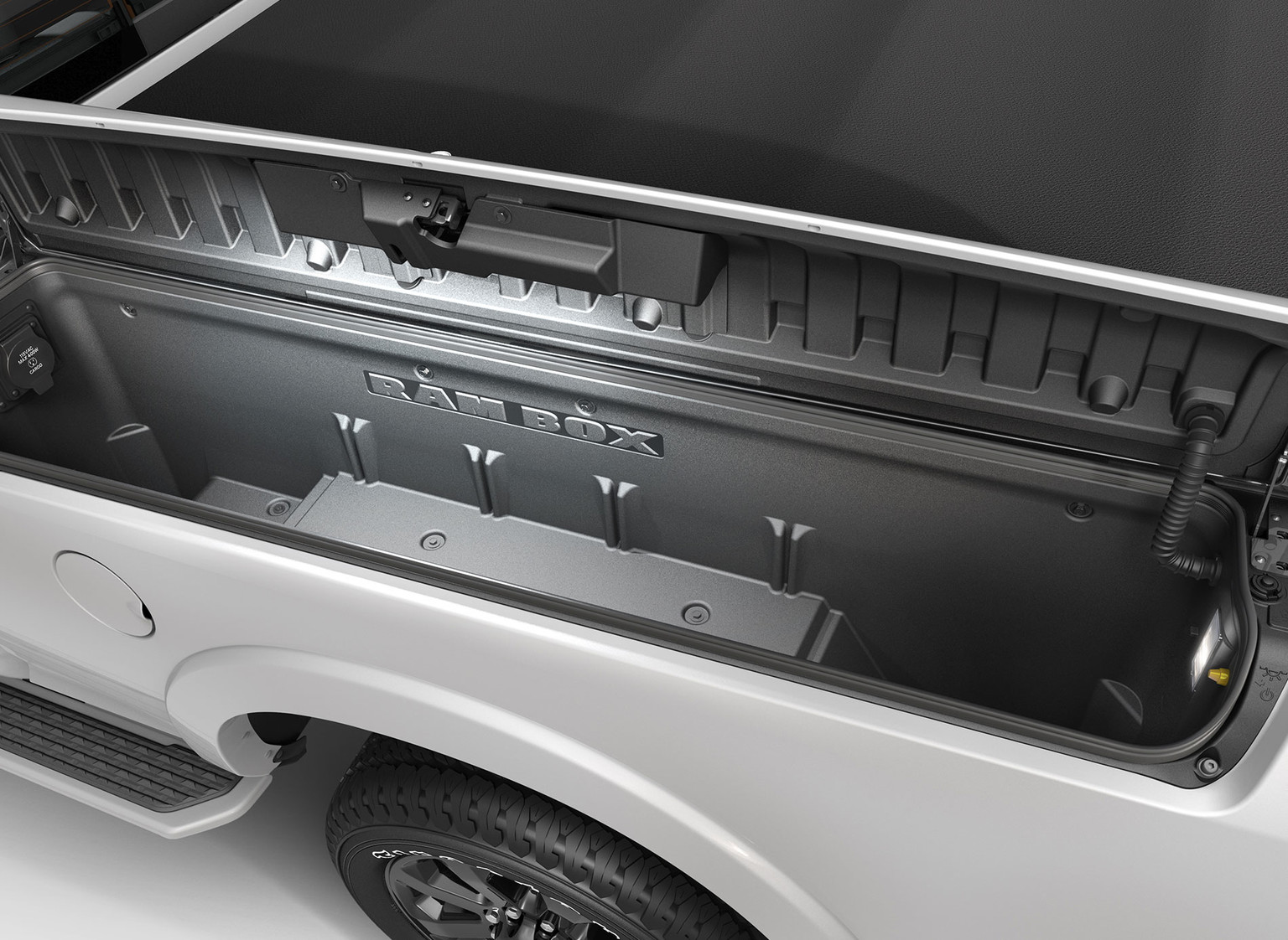 Side Compartment of a White 2019 Ram HD pickup Truck