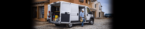 Ram ProMaster is parked as a construction worker exits the vehicle