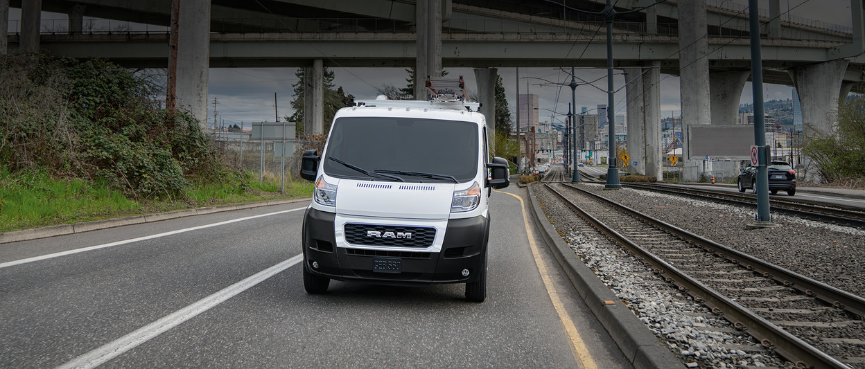 2019 Ram ProMaster front view, driving down highway, shown in white