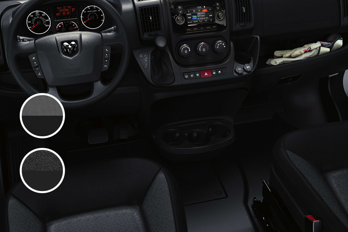 Comfortable Meets Durable Interior shot of the steering wheel and controls from the driver’s seat perspective.