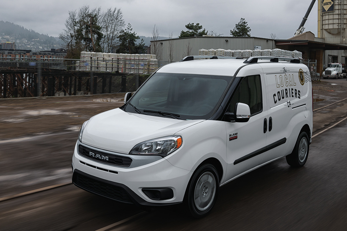 2019 Ram ProMaster City parked on city street, cargo area being loaded by local business