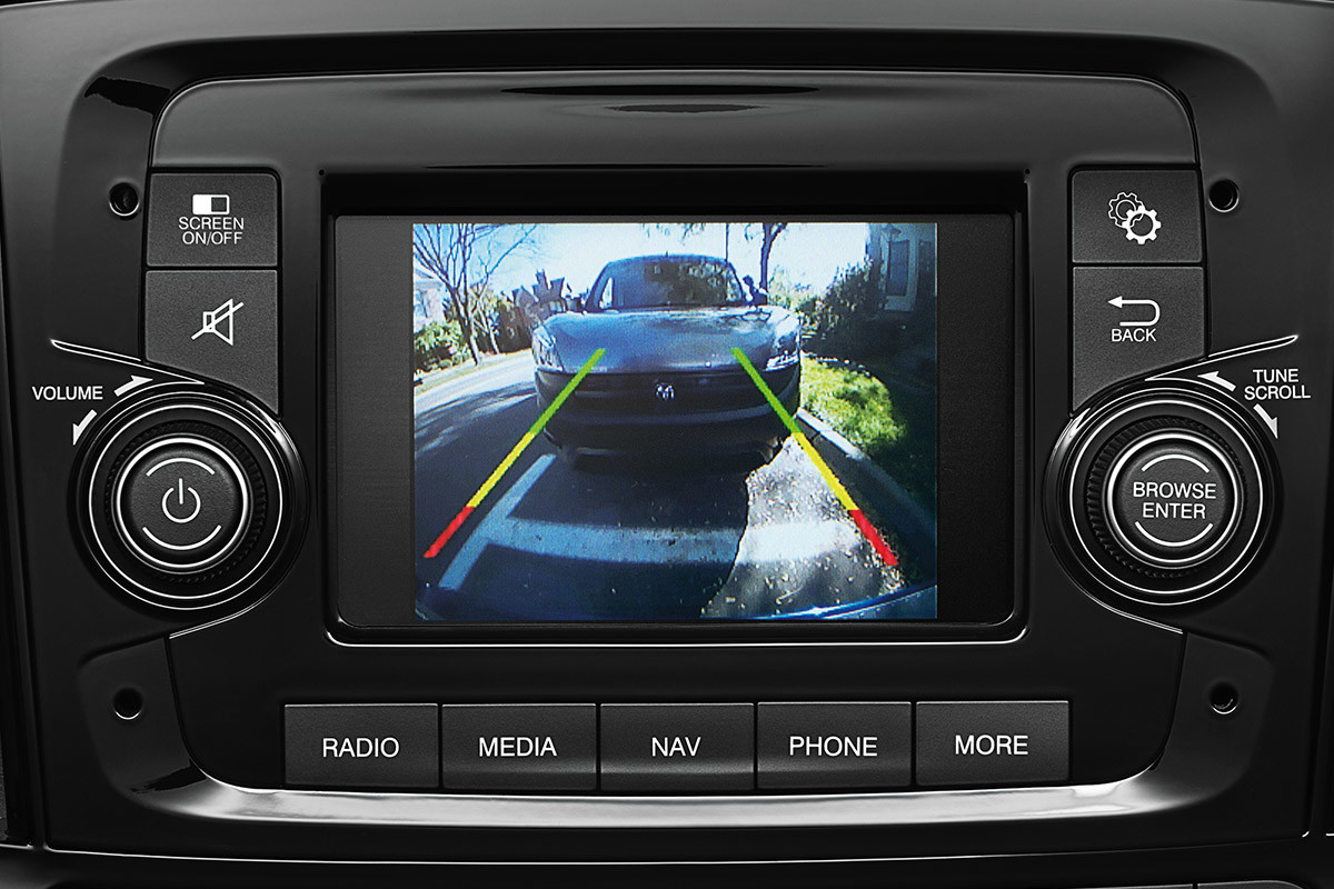 Close-up of the dashboard with focus on the 5-inch touchscreen, displaying video and graphics from the ParkView Rear Back Up Camera.