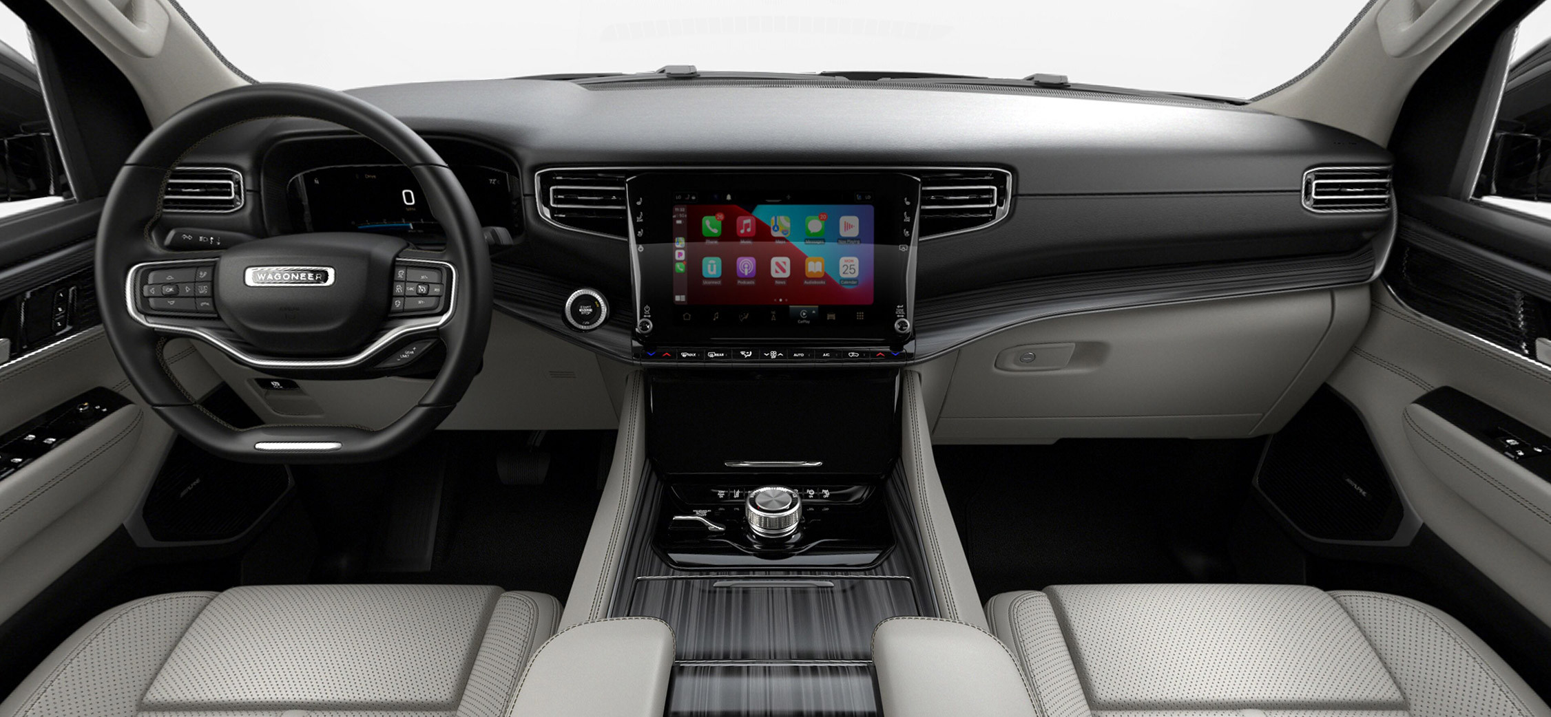 The interior of a 2022 Wagoneer showcasing global black with sea salt and basil accent stitching front seats