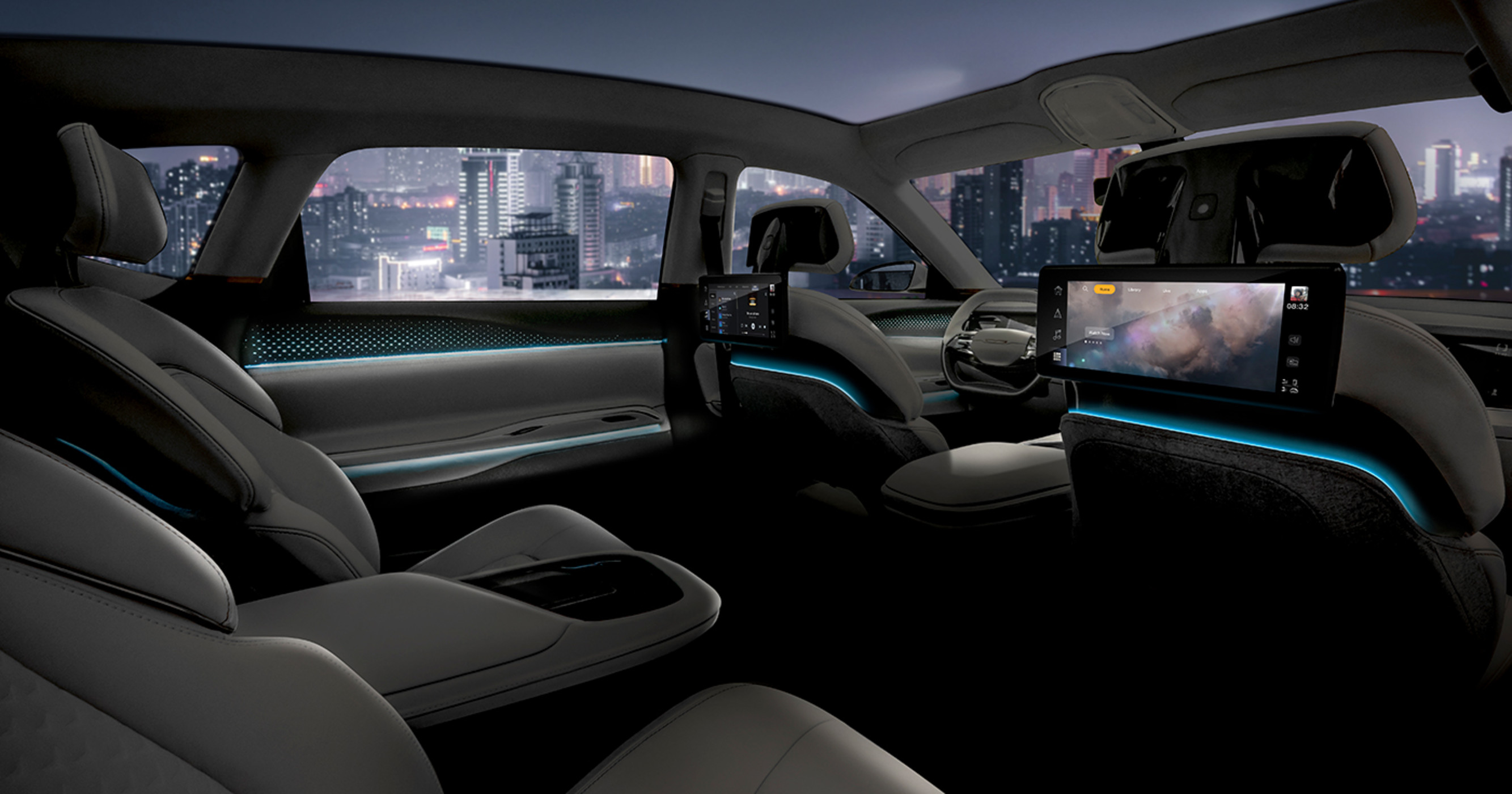An interior view of a concept vehicle from the backseat right side passenger, overlooking a city landscape.