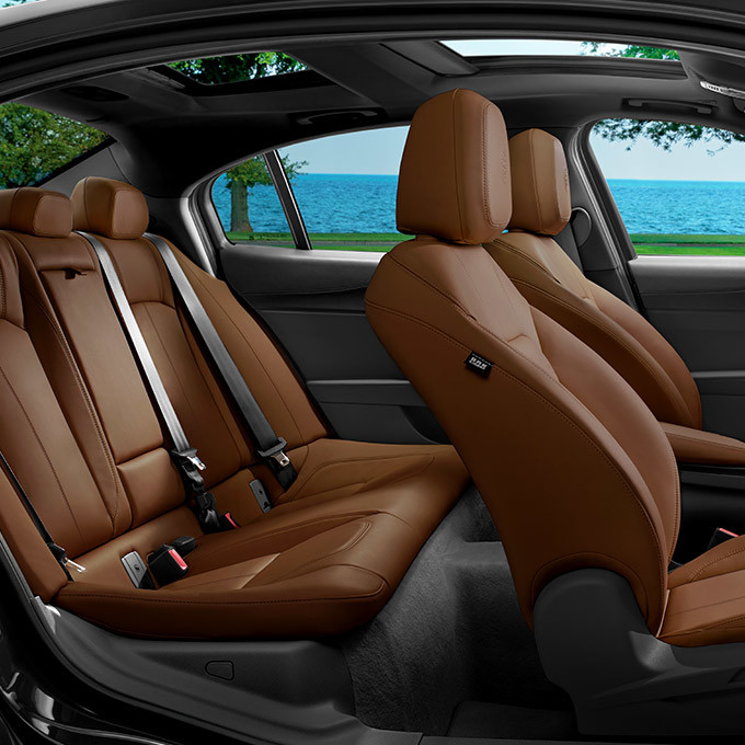 Side view of tan leather seats in the 2022 Alfa Romeo Giulia