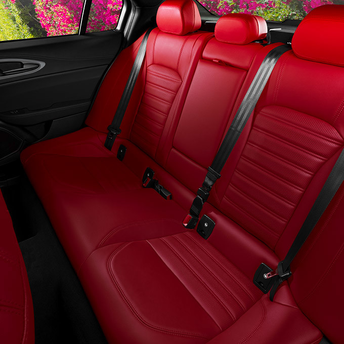 Red leather seats in a 2022 Alfa Romeo Giulia
