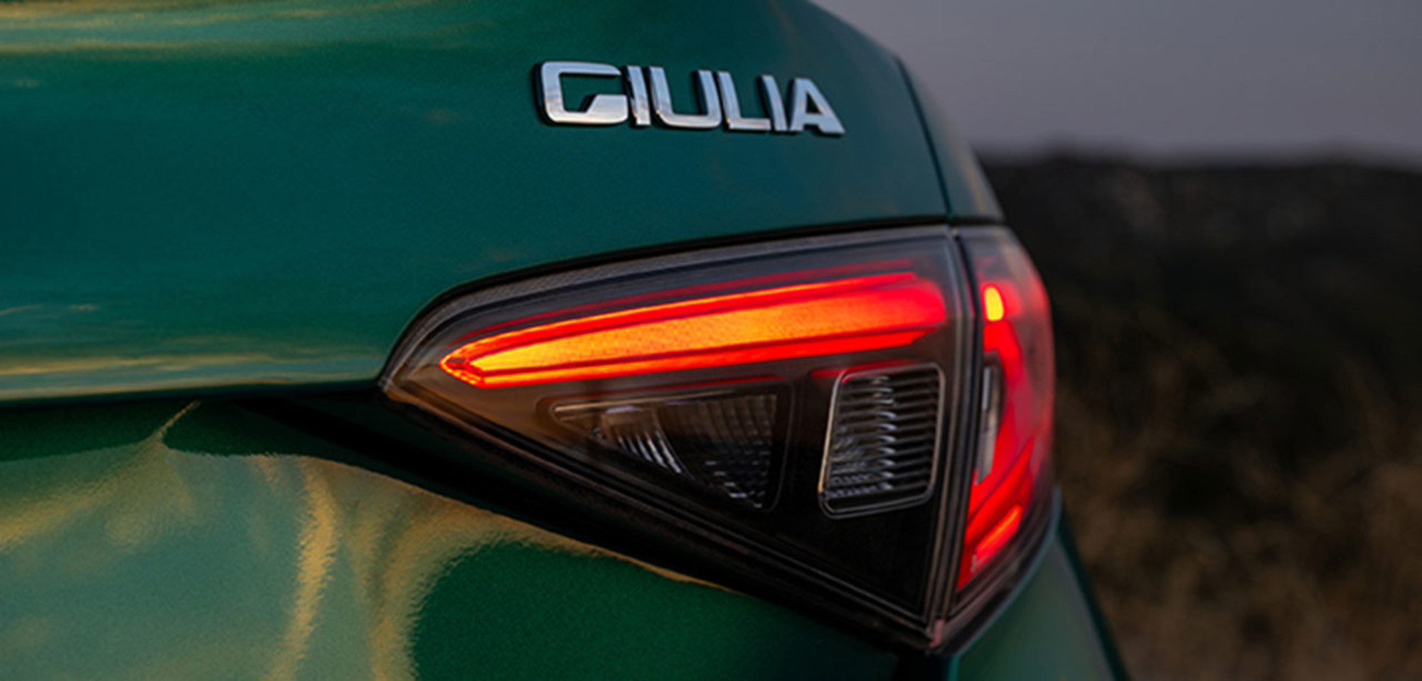 Close-up of the rear taillight and Giulia badge on the 2026 Alfa Romeo Giulia.