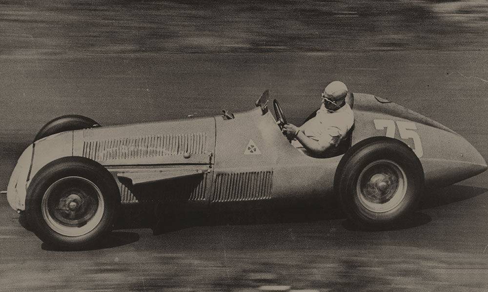 Juan Manuel Fangio driving a 1951 Alfa Romeo 159
