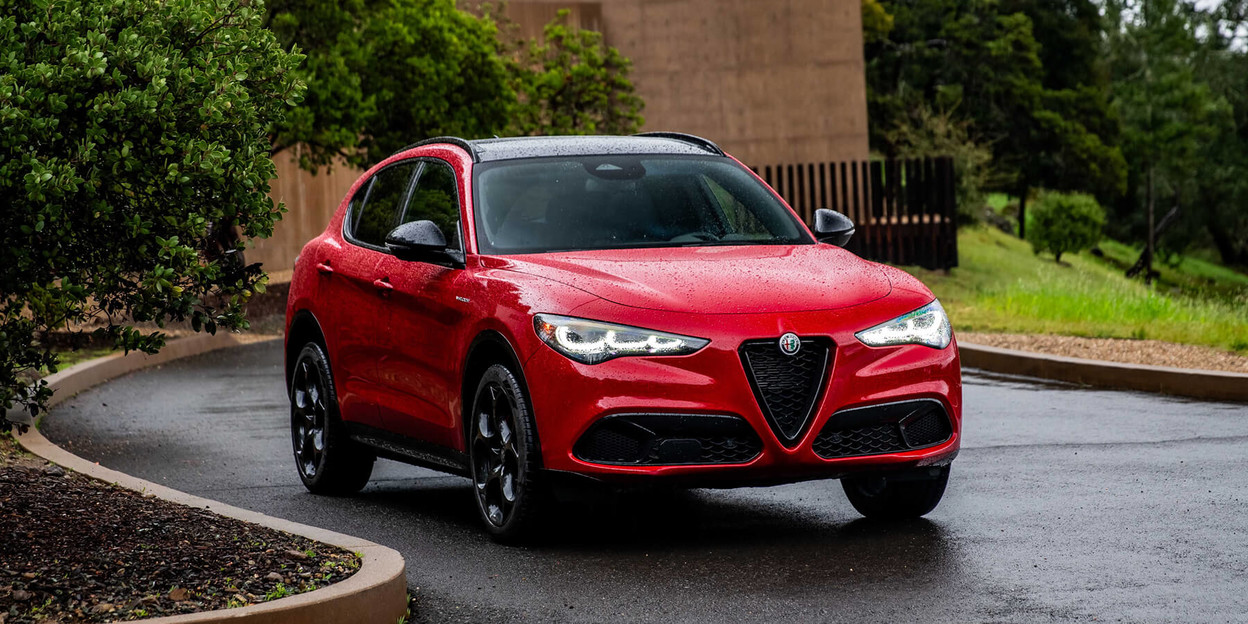 An Alfa Romeo Stelvio luxury SUV parked to promote the Win Your Wheels contest. Enter Now
