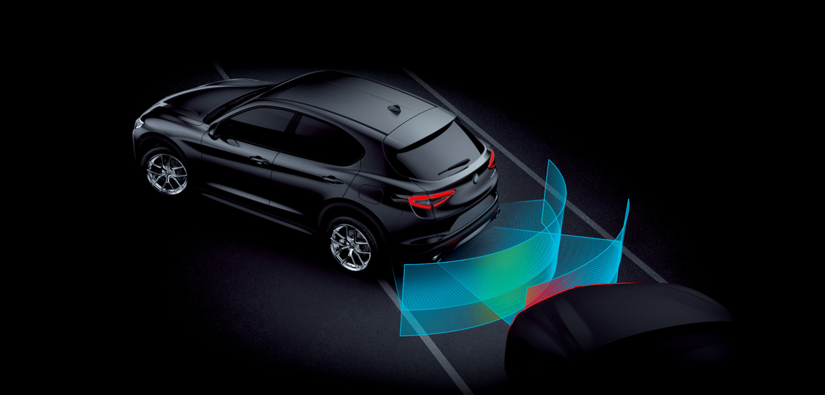 Une illustration du système de surveillance des angles morts dans l’Alfa Romeo Stelvio Quadrifoglio 2024.