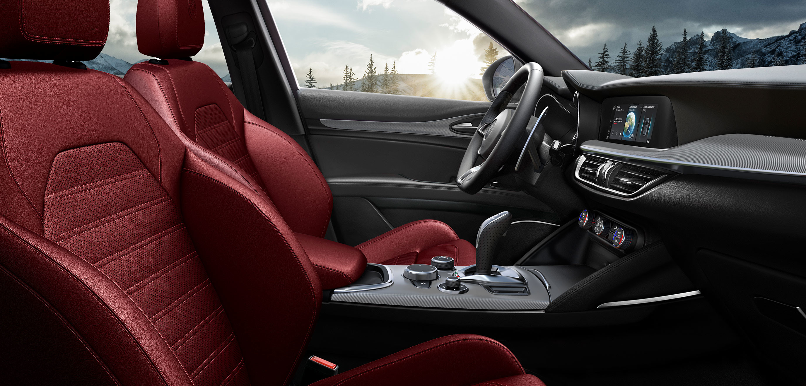 Une vue intérieure des sièges conducteur et passager avant d’une Alfa Romeo Stelvio 2025.