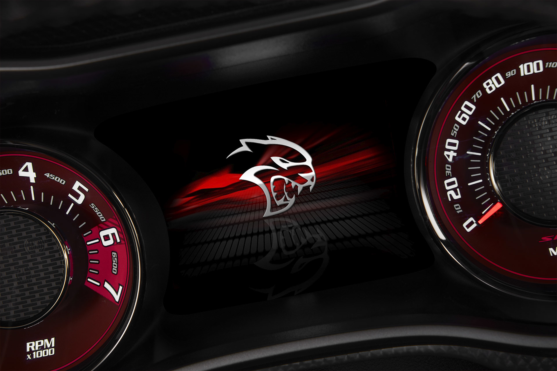 The 7-inch full-colour in-cluster display of a 2022 Dodge Challenger, displaying the SRT Hellcat Redeye splash screen.
