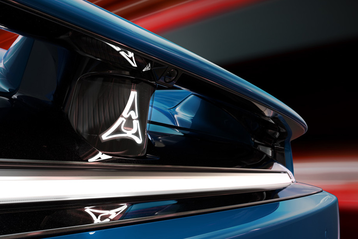 A close-up view of the triangular-shaped Dodge R-Wing logo design.
